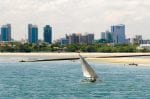 Day 1. : Skyline of Dar Es Salaam with ocean and sailing boat